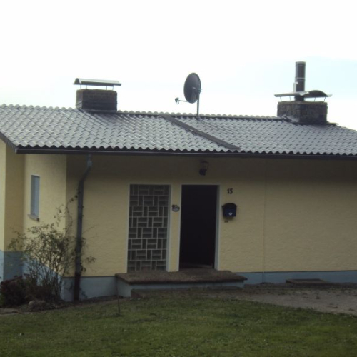 Dachbeschichtung eines Wochenendhauses gedeckt mit Berliner Welle