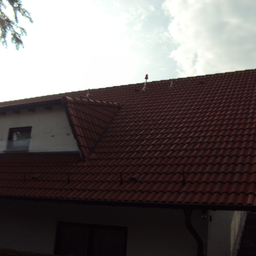 Dachsanierung in Ziegelrot