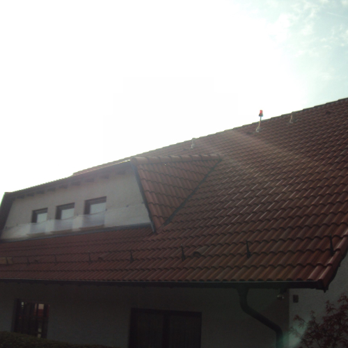 Dachsanierung in Ziegelrot