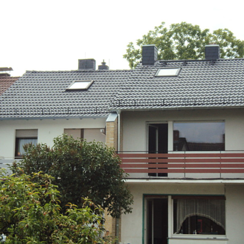 Dachreinigung und Beschichtung an 2 Doppelhaushälften in Anthrazit