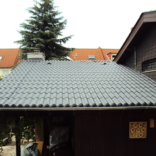 Dachreinigung und Dachbeschichtung an Berliner Welle (Flachdach)