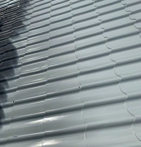 600 m² Blechdach Gewerbeobjekt - Dachsanierung durch Dachreinigung & Dachbeschichtung