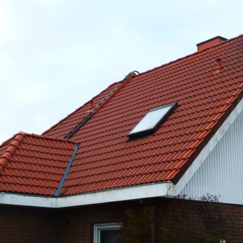 Sanierung eines Einfamilienhauses mit Krüppelwalmdach