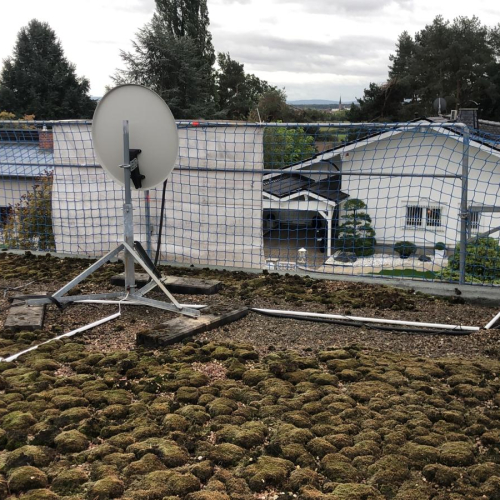 Flachdachaufbau mit Dämmung und Fassadensanierung