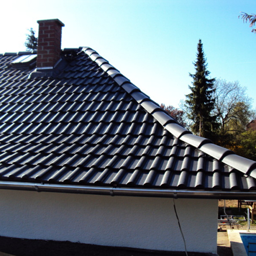 Dachreinigung und Dachbeschichtung am Walmdach