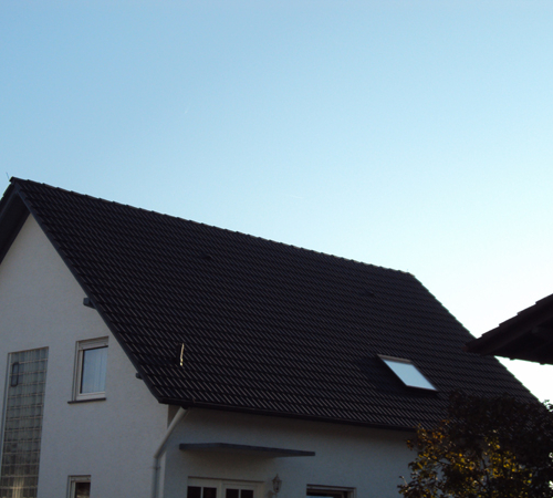 Dachsanierung bei Betonziegeln in Anthrazit