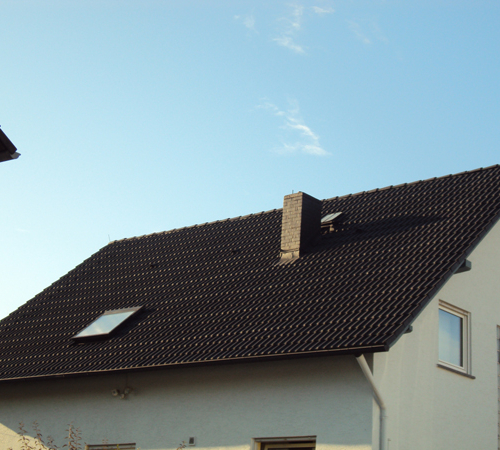 Dachsanierung bei Betonziegeln in Anthrazit