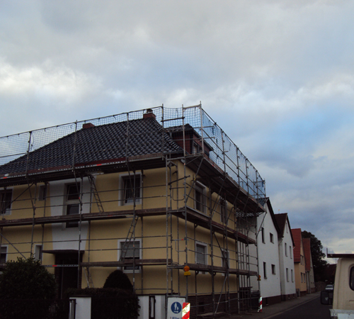 Dachsanierung bei Tonziegeln in Edelschwarz