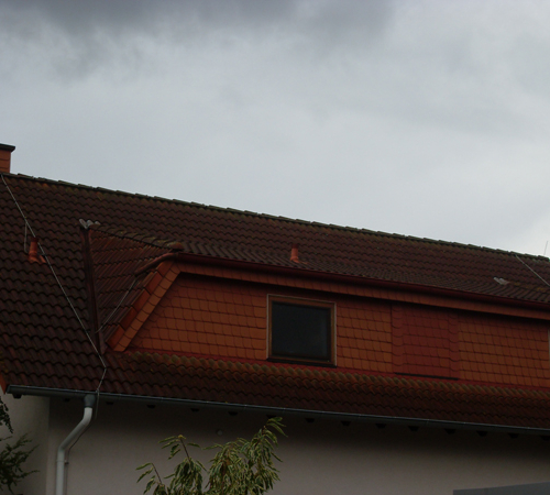 Dachreinigung und Beschichtung in Anthrazit und Edelschwarz