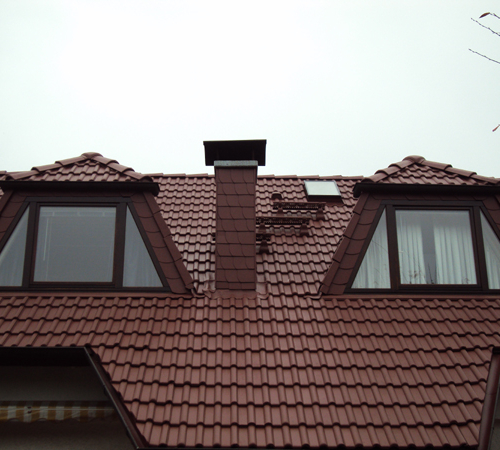 Oberflächensanierung von Betonziegeln Rotbraun