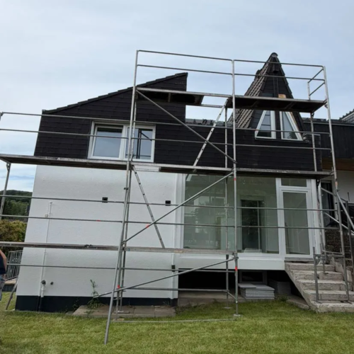 110m² Fassadenverkleidung mit Faserzementplatten/ Kunstschiefer