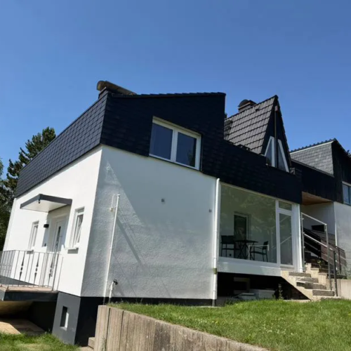 110m² Fassadenverkleidung mit Faserzementplatten/ Kunstschiefer