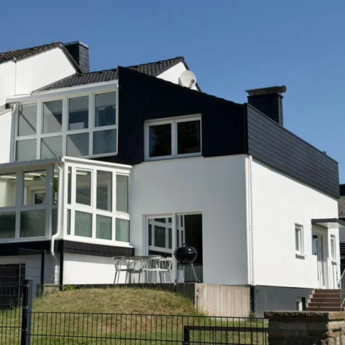 110m² Fassadenverkleidung mit Faserzementplatten/ Kunstschiefer